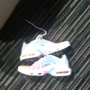 The multi colored Nikes